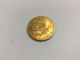 A 1906 Ten dollar Denver mint coin. Approx 16.75 g