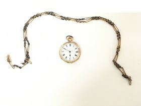 A 18ct gold pocket watch with a chain. Watch not s