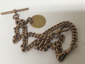 A Vintage 9carat gold watch chain with attached wo
