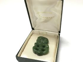 A boxed Jade Mauri Nepherite pendant , postage cat