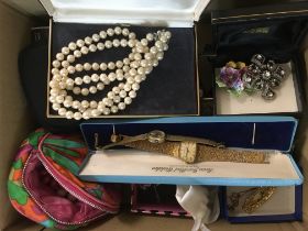 A box of mixed costume jewellery