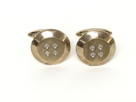 A pair of 9ct gold cufflinks. 6.77g. Postage A