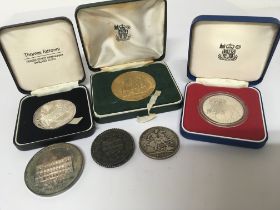 A collection of silver coins and other coins inclu