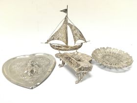 A collection of silver ornaments, postage category