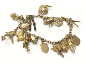 A 9ct gold charm bracelet, 29.2g postage category