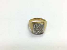 An 18ct gold ring set with ten diamonds, G-H colou