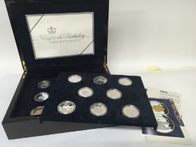 A cased set of Royal Mint Silver Proof coins Queen