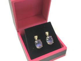 A pair of 9ct gold and topaz earrings , 2.3g. Post