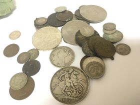 A collection of coinage including a Victorian 1896