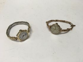 Two ladies 9ct gold watches, one with a sprung lin