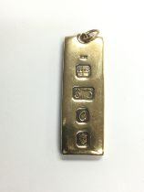 A 9ct gold ingot pendant, approx 2.9g. Shipping ca