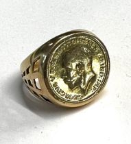 A marked 18ct gold ring, (inset George V Sovereign