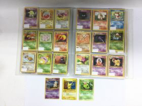 A binder of Pokemon cards to include three Japanes