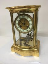 A Quality gilt metal four glass mantel clock with