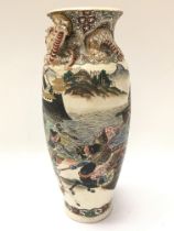 A Japanese Satsuma vase decorated with a battle sc