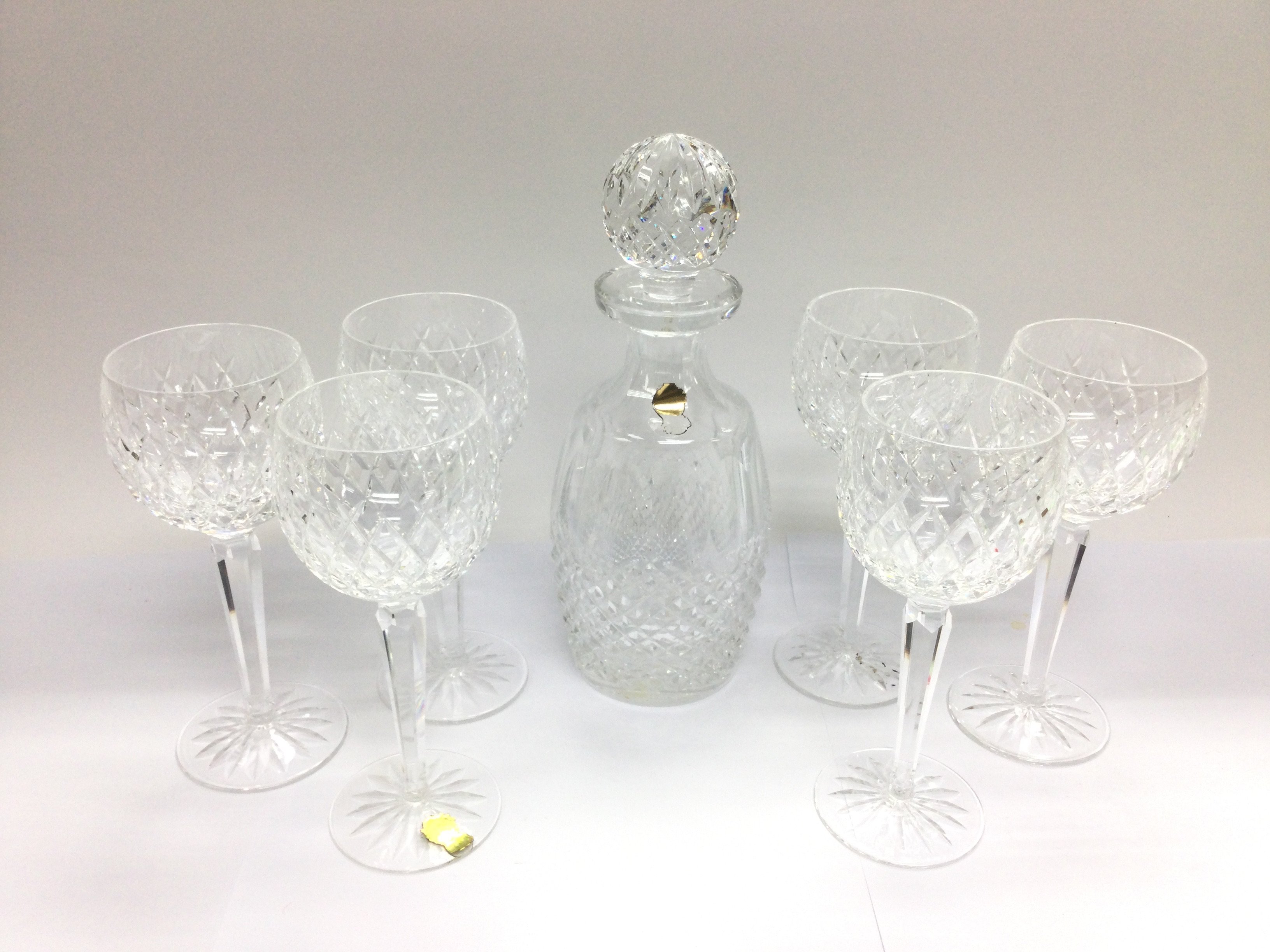 A Waterford crystal decanter and six glasses. Ship