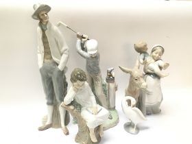 A collection of Lladro porcelain figurines ranging