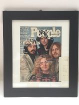 A unique framed and glazed magazine cover signed b