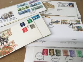 A collection of stamps including four Albums of GB