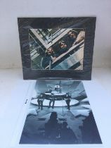 Two photographic prints of The Beatles signed 'Rin