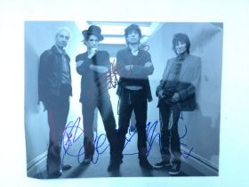 An unframed signed photo of The Rolling Stones, ap