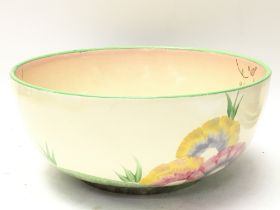 A Clarice Cliff Honeyglaze bowl, 19.5cm approximat