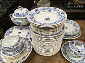A large Victorian ceramic dinner set decorated wit