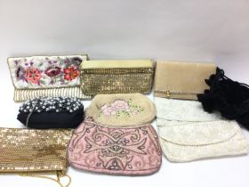 A collection of beaded purses and leather bags inc