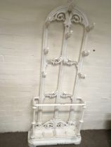 A late Victorian Cast iron hall stand with an arch