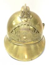 A French brass firemans helmet, postage category C