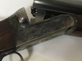 A 12bore Shotgun side by side 26inch barrel engrav