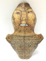 An unusual bone African tribal mask, approximately