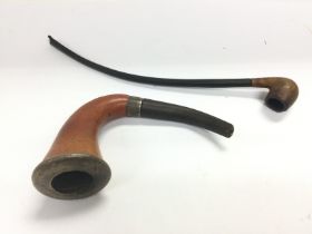 Two smoker's pipes including a silver mounted exam