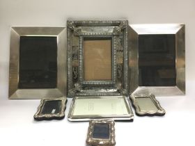 A collection of modern picture frames. Shipping category D.