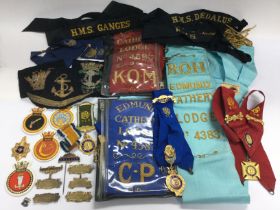 A collection of Masonic regalia and some Naval hat