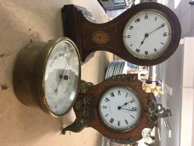 A French mantle clock with gilt mounts, an Edwardi