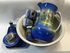 A vintage ceramic wash bowl set with matching dres