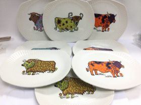 A collection of Beefeater plates and some liqueur