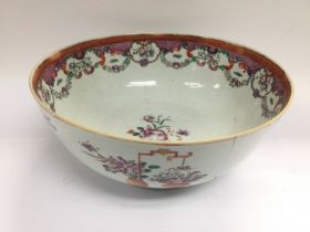 A 19th Century Canton bowl, a/f, with floral decor