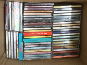 Two boxes of CDs by various artists including regg