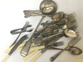 A collection of silver plated cutlery including a