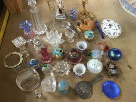 A collection of glass trinkets and perfume bottles