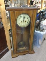 A mahogany cased 8 day wall clock, approx height 8