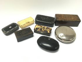 A collection of Victorian snuff boxes including bo