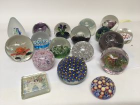 A collection of paperweights including millefiori