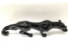 A black panther figure , 73cm long. Postage catego