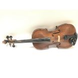 A cased student violin , 57cm long. Postage catego