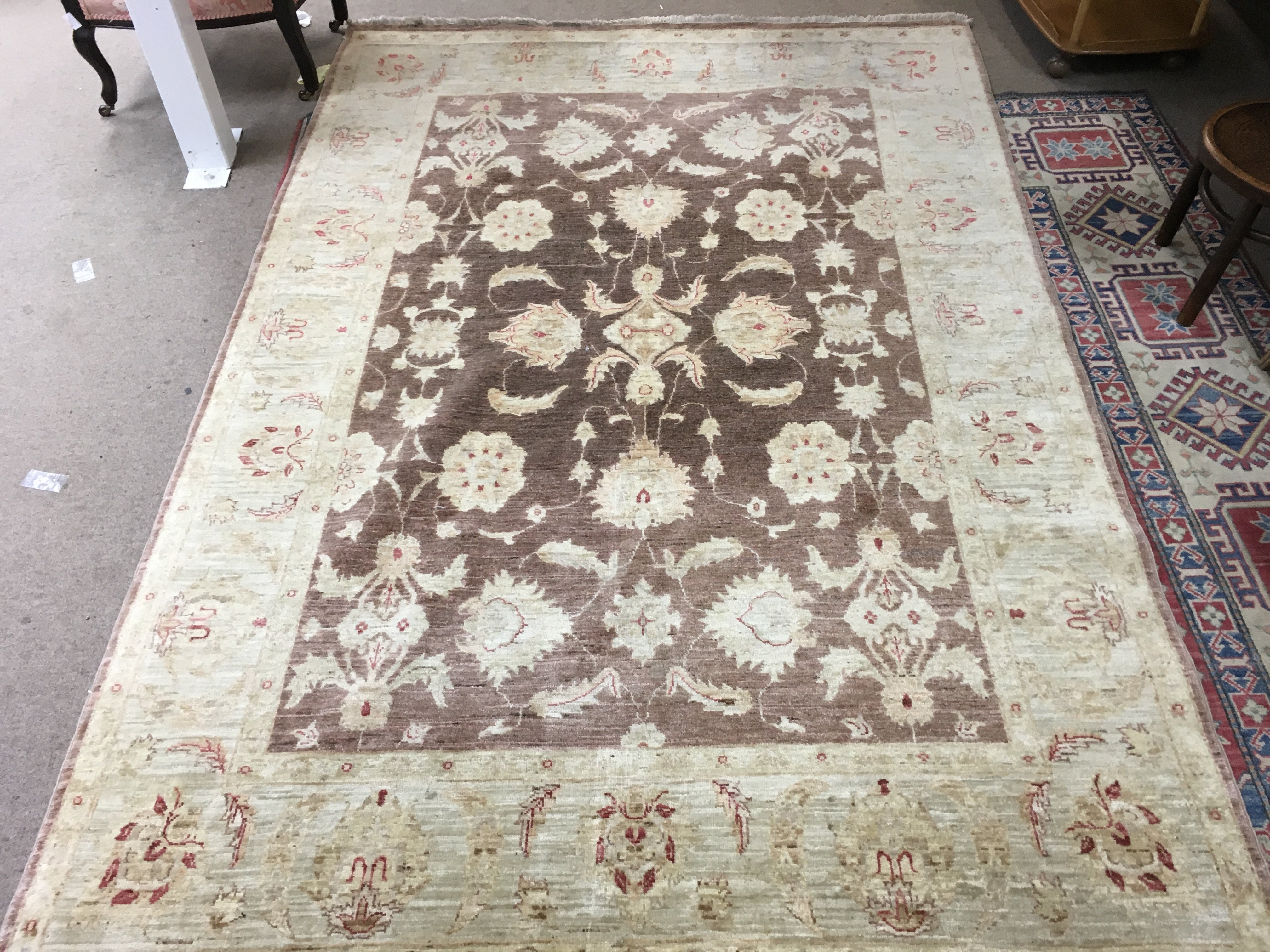 A large Floral hand woven Rug 174x 260cm. Postage category D
