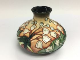 A limited edition Moorcroft onion vase decorated w