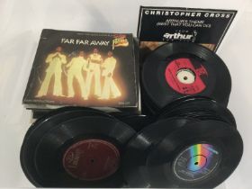 A box of 7inch singles by artists from the 1960s o
